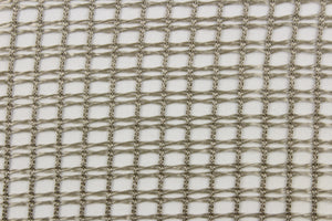 This sheer fabric features a net weave design in a pewter. 