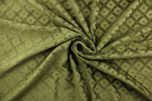 Load image into Gallery viewer, This multi use, hard wearing chenille fabric features a diamond pattern with circles in green and would be a beautiful accent to your home décor.  It is a heavyweight fabric that is soft and is perfect for upholstery projects, toss pillows, and heavy drapery.

