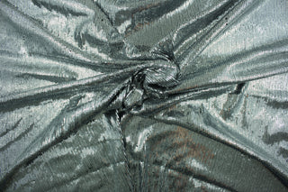 Sparkle and shimmer with this beautiful fabric.  The black stretch polyester fabric features thousands of silver sequins for a glitzy touch.  It is perfect for special occasion apparel, costumes, table tops, decorations and more.  