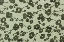 Load image into Gallery viewer, This jacquard fabric features small flowers in dark mauve on a light silver background. 

