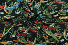 Load image into Gallery viewer, This fabric features old cars and tropical leaves on a black background. The lightweight fabric is easy to sew and has a soft hand.   The versatile fabric makes it great for quilting, crafting and home décor.  Colors include olive green, blue, red, gray, and light orange.

