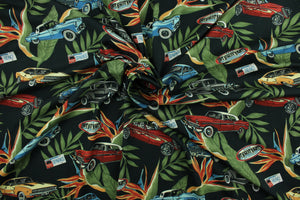This fabric features old cars and tropical leaves on a black background. The lightweight fabric is easy to sew and has a soft hand.   The versatile fabric makes it great for quilting, crafting and home décor.  Colors include olive green, blue, red, gray, and light orange.