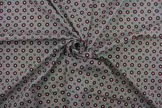 This fabric features a kaleidoscope of flowers in red, white, black, and gray.  This lightweight fabric is easy to sew and has a soft hand.   The versatile fabric makes it great for quilting, crafting and home décor.