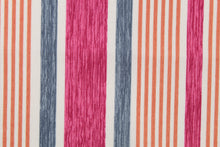 Load image into Gallery viewer, This multi use fabric features a heavy striped design in pink, blue, orange and white.
