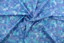 Load image into Gallery viewer,  This fabric features butterflies and small flowers in white, blue, and violet.  The lightweight fabric is easy to sew and has a soft hand.  The versatile fabric makes it great for quilting, crafting and home décor.  
