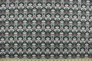 This fabric features an abstract design in red, gray, black and white.  The lightweight fabric is easy to sew and has a soft hand.  The versatile fabric makes it great for quilting, crafting and home décor.