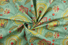 Load image into Gallery viewer, This fabric features a floral design in  green, orange, cream, dark pink, yellow and dark gray against a blue green.
