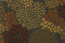 Load image into Gallery viewer, This fabric features a floral design in gold, brown, bronze and a dark rust orange with a latex backing. 
