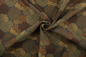 This fabric features a floral design in gold, brown, bronze and a dark rust orange with a latex backing. 