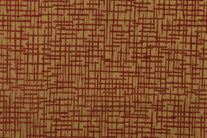 This fabric features an abstract design in a rich red and brown  with a latex backing. 
