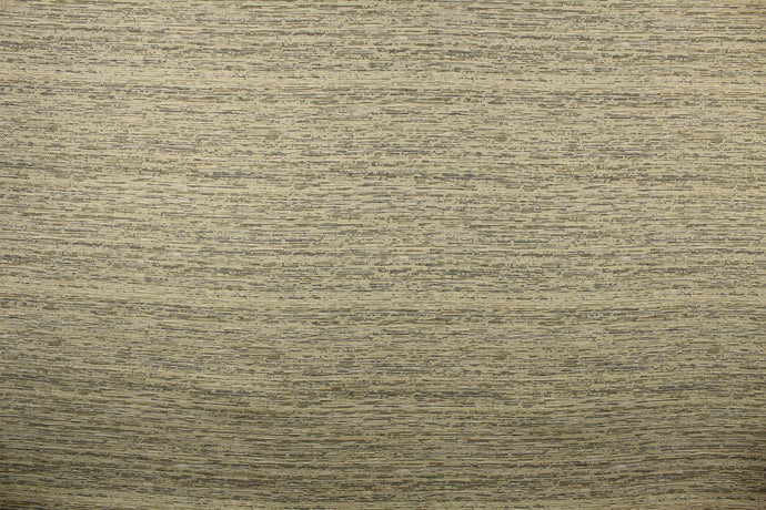 Mock linen in taupe with hints of black, gray, and white  with a latex backing.