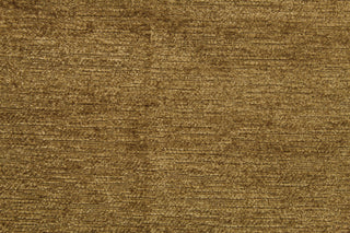This fabric features chenille in rich golden tan .