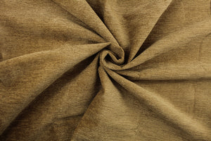 This fabric features chenille in rich golden tan .