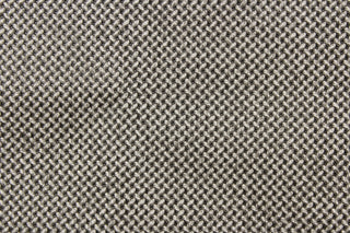 This vinyl fabric features a weave design in black and gray .