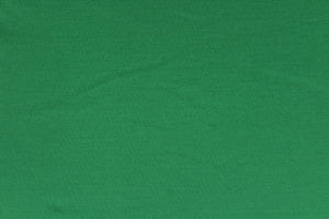 A 8 way stretch jersey lycra in a solid green. 