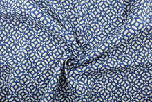 Load image into Gallery viewer, This outdoor fabric features a geometric design in blue and white .
