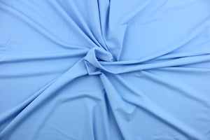  An 8 way lycra  fabric in a solid light blue .