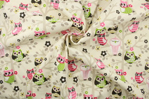 This fabric features owls sitting in trees design in hot pink, lime green, gray, mustard yellow, dark brown, pink, white, and off white .