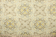 Load image into Gallery viewer, This  fabric features a medallion design in gray, taupe, yellow, and dull white .
