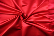 Load image into Gallery viewer,  A beautiful satin fabric in a red color . 
