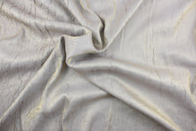 Load image into Gallery viewer,  This taffeta fabric features a crinkle in iridescent in a pale blue purple color with gold 

