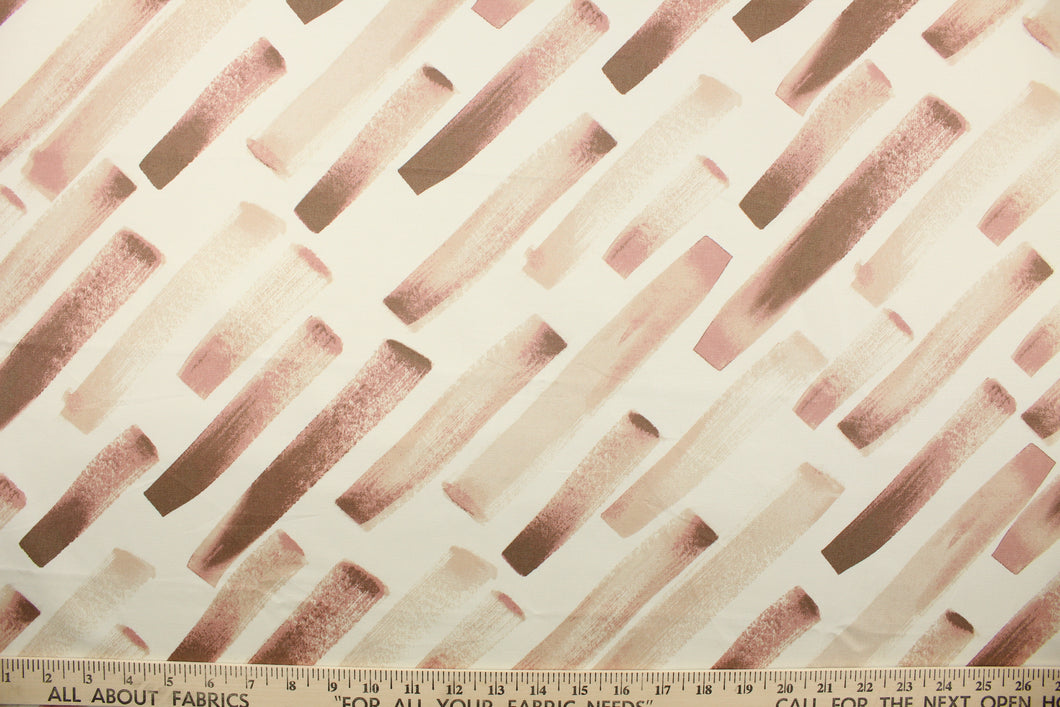This fabric features a diagonal broken stripe design in mauve, brown, pale beige, rose pink and white.
