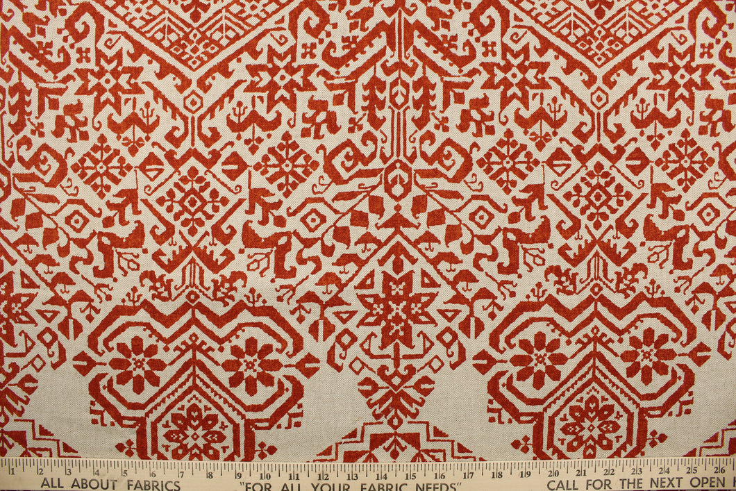  This fabric features a bohemian design in a dark orange and beige . 