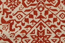 Load image into Gallery viewer,  This fabric features a bohemian design in a dark orange and beige . 
