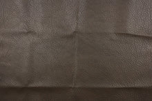 Load image into Gallery viewer, This vinyl fabric has a crackle design in a rich dark brown. 

