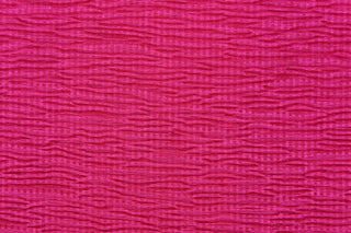 This taffeta fabric features a crinkle in rich dark pink.