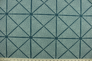 This fabric features a geometrical design in navy blue and white.  It can be used for several different statement projects including window accents (drapery, curtains and swags), decorative pillows, hand bags, bed skirts, duvet covers, light duty upholstery and craft projects.  It has a soft workable feel yet is stable and durable.   