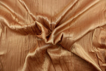 Load image into Gallery viewer, This taffeta fabric features a crinkle in iridescent rich tan with gold shimmer .
