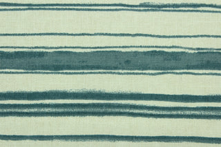 This fabric features stripes in indigo on a natural background.  It can be used for several different statement projects including window accents (drapery, curtains and swags), decorative pillows, hand bags, bed skirts, duvet covers, light duty upholstery and craft projects.  It has a soft workable feel yet is stable and durable.  We offer this design in several different colors.