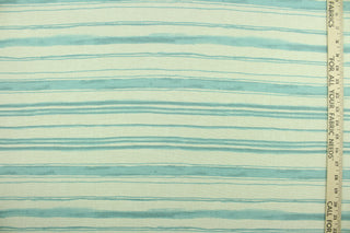 This fabric features stripes in lagoon green on a natural background.  It can be used for several different statement projects including window accents (drapery, curtains and swags), decorative pillows, hand bags, bed skirts, duvet covers, light duty upholstery and craft projects.  It has a soft workable feel yet is stable and durable.  We offer this design in several different colors.