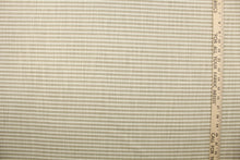 Load image into Gallery viewer, Austere is a horizonal striped fabric in khaki and  off white.  The multi use fabric is perfect for window treatments, decorative pillows, custom cushions, bedding, light duty upholstery applications and almost any craft project.  This fabric has a soft workable feel yet is stable and durable.
