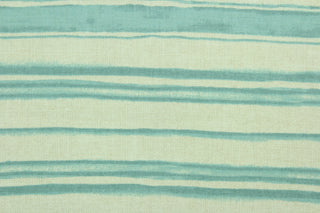 This fabric features stripes in lagoon green on a natural background.  It can be used for several different statement projects including window accents (drapery, curtains and swags), decorative pillows, hand bags, bed skirts, duvet covers, light duty upholstery and craft projects.  It has a soft workable feel yet is stable and durable.  We offer this design in several different colors.