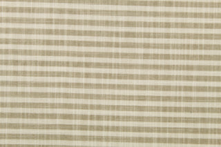 Austere is a horizonal striped fabric in khaki and off white.  The multi use fabric is perfect for window treatments, decorative pillows, custom cushions, bedding, light duty upholstery applications and almost any craft project.  This fabric has a soft workable feel yet is stable and durable.