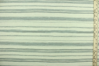 This fabric features stripes in gray on a natural background.  It can be used for several different statement projects including window accents (drapery, curtains and swags), decorative pillows, hand bags, bed skirts, duvet covers, light duty upholstery and craft projects.  It has a soft workable feel yet is stable and durable.  We offer this design in several different colors.