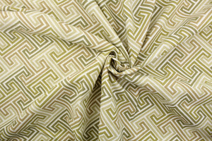 Elton is a cotton print with slub yarns used for texture.  The colors in this geometrical design are olive, celery, pecan and off white.  The multi use fabric is perfect for window treatments, decorative pillows, custom cushions, bedding, light duty upholstery applications and almost any craft project.  This fabric has a soft workable feel yet is stable and durable with 50,000 double rubs.
