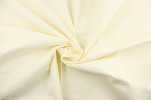  Poplin fabric in a solid creamy white . 