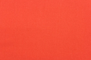 Poplin fabric in a solid orange. 