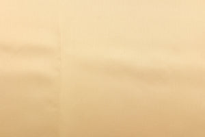  A beautiful satin fabric in a gold color. 