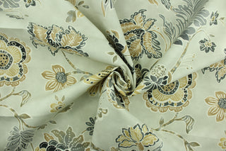 Portara features a large floral design in brown, grey, gold and ivory on a natural background.  It can be used for several different statement projects including window accents (drapery, curtains and swags), decorative pillows, hand bags, bed skirts, duvet covers, light duty upholstery and craft projects.  It has a soft workable feel yet is stable and durable.  