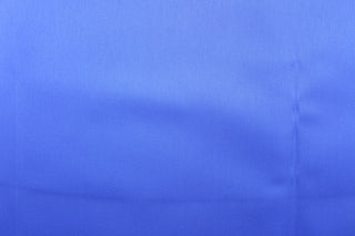 A beautiful satin fabric in a royal blue color. 