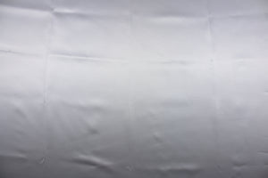 A beautiful satin fabric in a silver color.