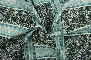 Luiza is a versatile medium/heavyweight fabric featuring an Aztec design in indigo, teal, grayish blue and ivory.  It can be used for several different statement projects including window accents (drapery, curtains and swags), decorative pillows, hand bags, bed skirts, duvet covers, light duty upholstery and craft projects.  It has a durability rating of 15,000 double rubs.
