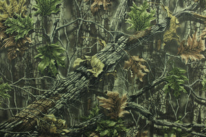 This camouflage fabric features realistic branches and leaves in various shades of green, brown and black against a hunter green background.  The fabric offers maximum concealment and is perfect for all open areas and is water repellant.  Uses include coveralls, pants, jackets, hats and bags.  We offer several different camouflage designs.