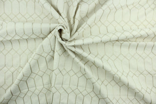 This textured tone on tone fabric features a lattice embroidered design in the shade of linen.  Uses include drapery, pillows, light upholstery, table runners, bedding, headboards, home décor and apparel.