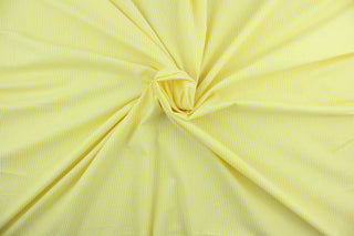 This poly/cotton fabric in yellow and white stripes is lightweight and is commonly used to make a variety of clothing including suits, dresses, shorts and shirts.  It is versatile enough to use in your home décor projects such as curtains and bedding.  We offer this fabric in a variety of colors.  