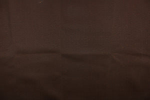  A solid dark brown fabric.